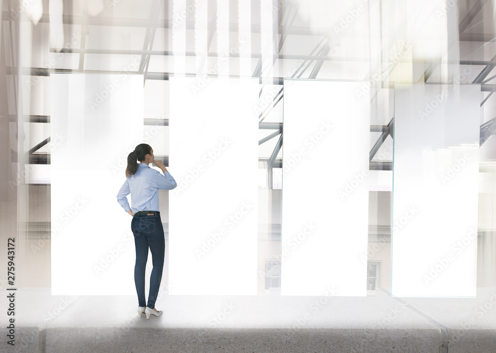 Industrial roll up banners design templates set. Young woman looking at the banners with space for your text or image Industrial roll up banners design templates set. Young woman looking at the banners with space for your text or image