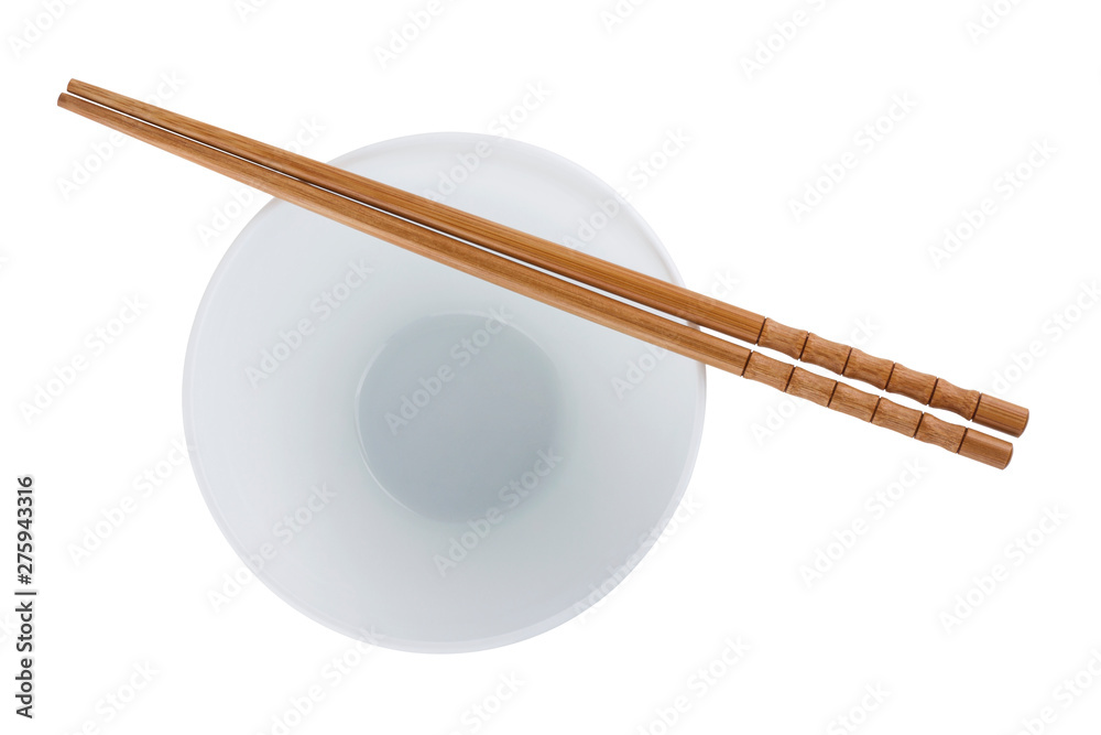 White bowl with chopsticks isolated on white background White bowl with chopsticks isolated on white background