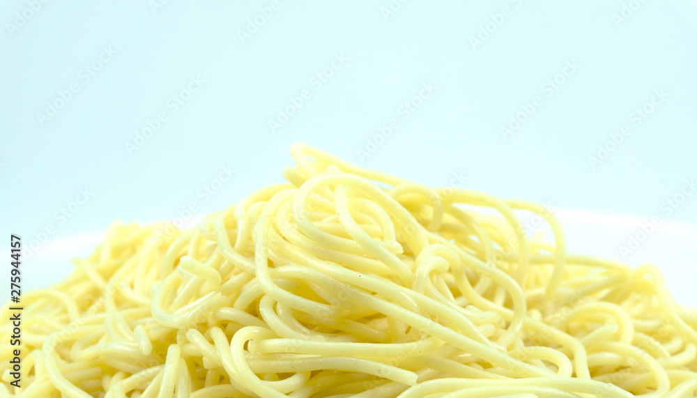 Yellow long spaghetti on white background, Blank for design, food concept.. Yellow long spaghetti on white background, Blank for design, food concept..