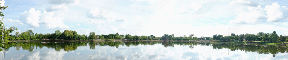Fototapeta premium Panorama view of Beautiful lake is mountainous in the background, Copy Space..