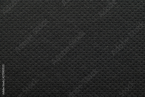 Close-up polyester fabric texture of black athletic shirt photo