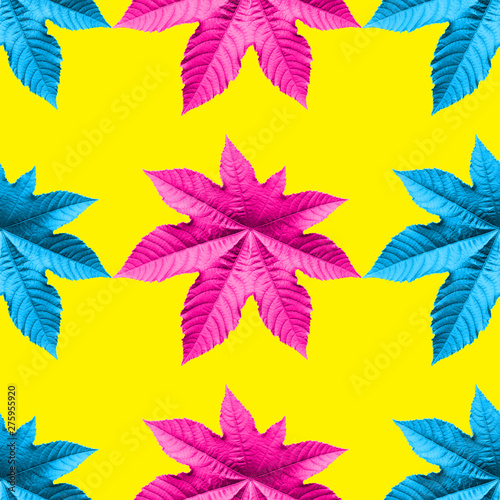 Seamless bright pattern from ricinus communis yellow with pink color photo