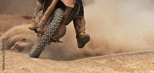 Fototapeta Naklejka Na Ścianę i Meble -  Motocross racer accelerating speed in track,driving in the motocross race