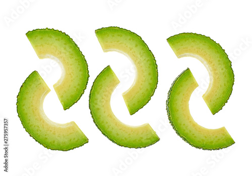 Avocado slices isolated on white background, top view.