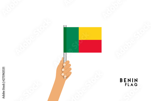 Vector cartoon illustration of human hands hold Benin flag. Isolated object on white background.