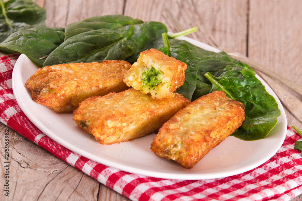 Potato croquettes with spinach and mozzarella. Potato croquettes with spinach and mozzarella.