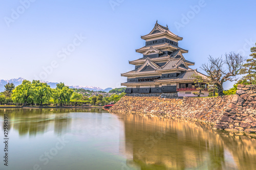 Matsumoto - May 25  2019  The castle of Matsumoto and the red bridge leading to it  Japan