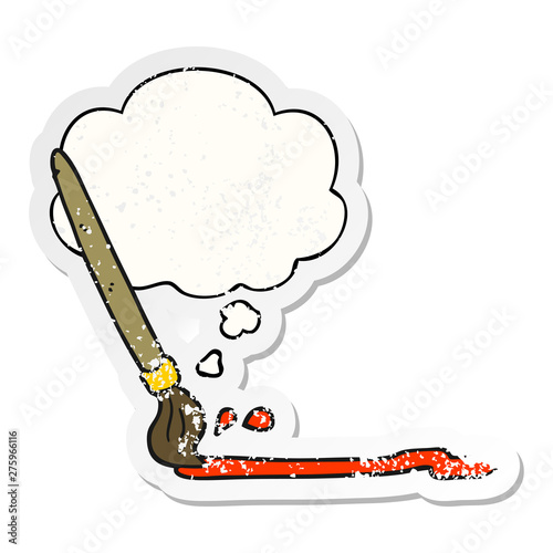 cartoon paintbrush and thought bubble as a distressed worn sticker