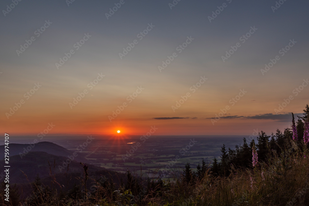 Obraz premium Color summer sunset view from Javorovy hill over Trinec town