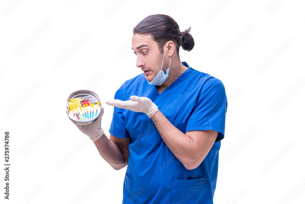 Young handsome doctor with syringe isolated on white Young handsome doctor with syringe isolated on white