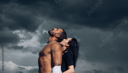 Passion love couple. Romantic moment. Handsome muscular guy and amazing sexy woman. Cosmopolitan couple. Love and flirt. photo