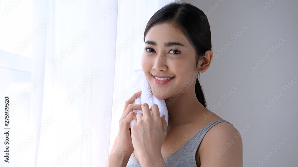 Holiday concept. Asian girls are wiping her face with care. Holiday concept. Asian girls are wiping her face with care.