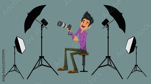 photographer in his studio with equipment