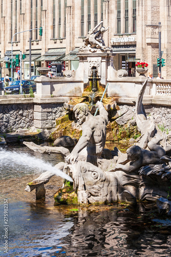 Triton Fountain or Tritonenbrunnen located at Konigsallee or King's Avenue in Dusseldorf city in Germany photo