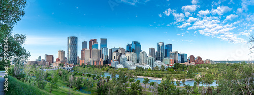 Panoramic view of Calgary's skyline on a summer day.