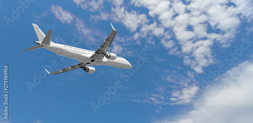 Airplane flying in the blue sky,