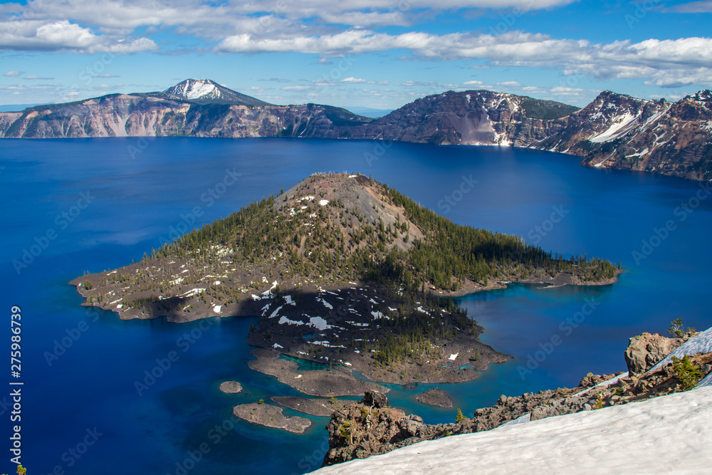 Crater Lake, OR. Island with deep blue water
