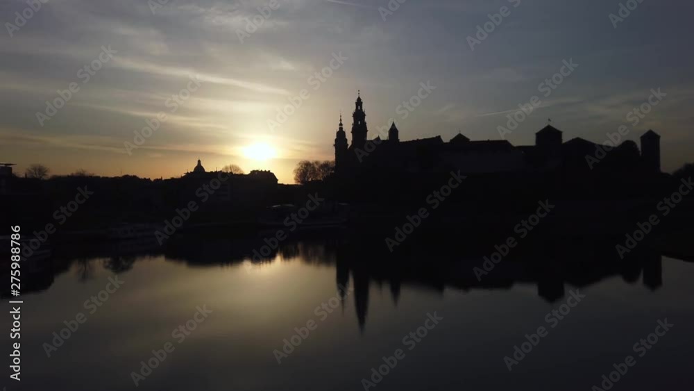 Hyperlapse 4k sequence with silhouette of Wawel Castle over Vistula river in Krakow city, Poland, captured on a bright morning with rising Sun, Hyperlapse 4k sequence with silhouette of Wawel Castle over Vistula river in Krakow city, Poland, captured on a bright morning with rising Sun,