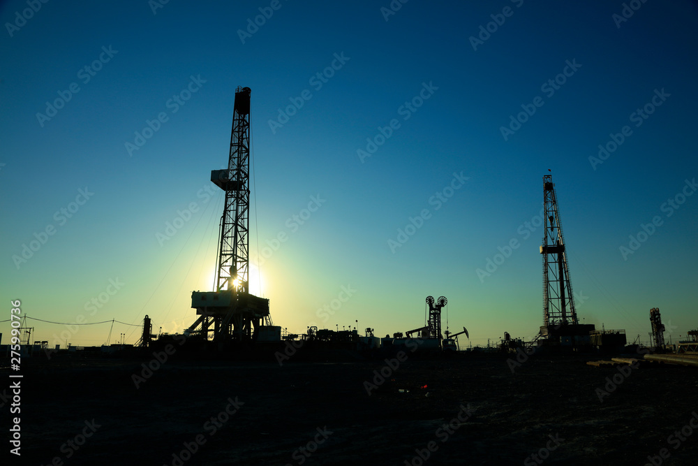 Oil drilling derrick in oilfield