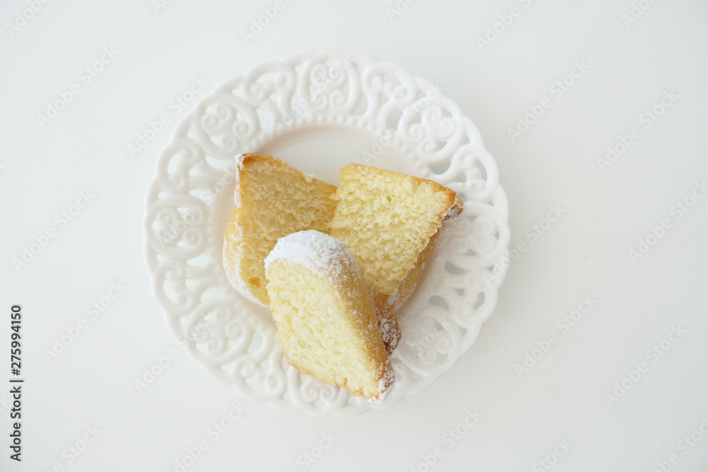 Homemade Cake Slices in a Plate isolated on a White Background Homemade Cake Slices in a Plate isolated on a White Background