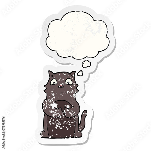 cartoon cat and thought bubble as a distressed worn sticker
