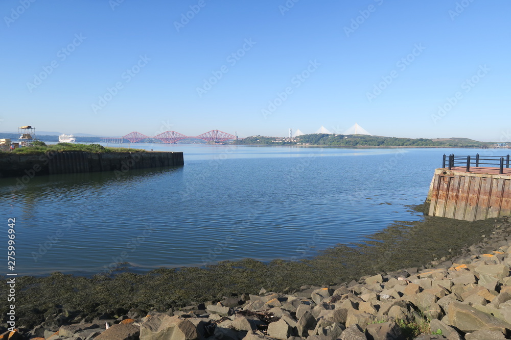 The river Forth from Dalgety Bay with Forth Rail bridge