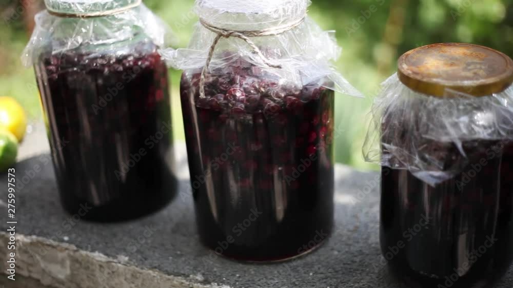 Compote of Organic Cherries in a Glass Jar at Home Compote of Organic Cherries in a Glass Jar at Home