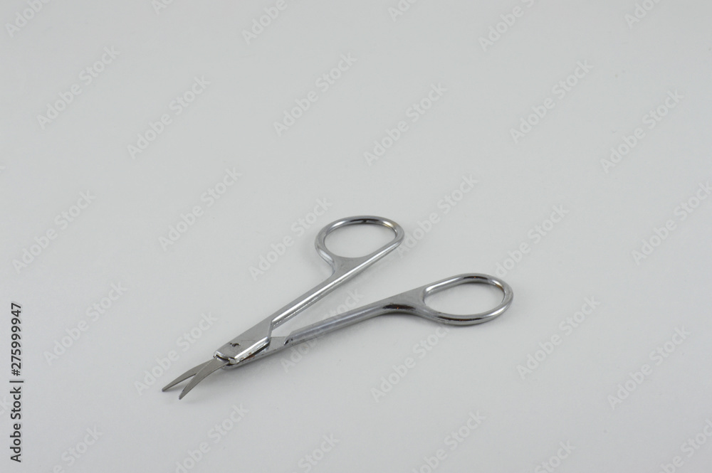 Isolated on white background manicure scissors for women Isolated on white background manicure scissors for women