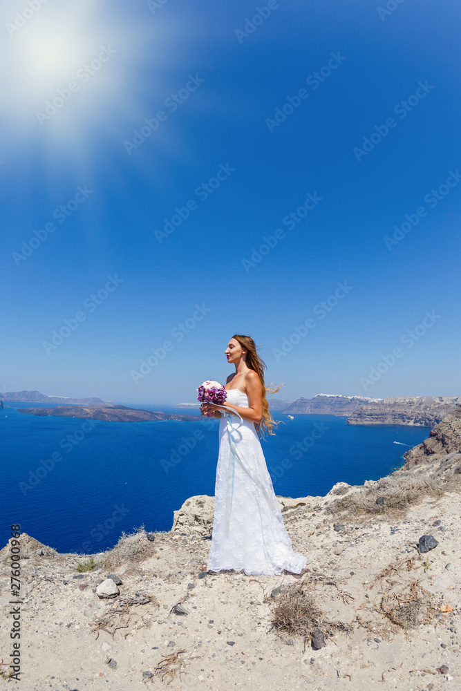 Beautiful woman in a white dress