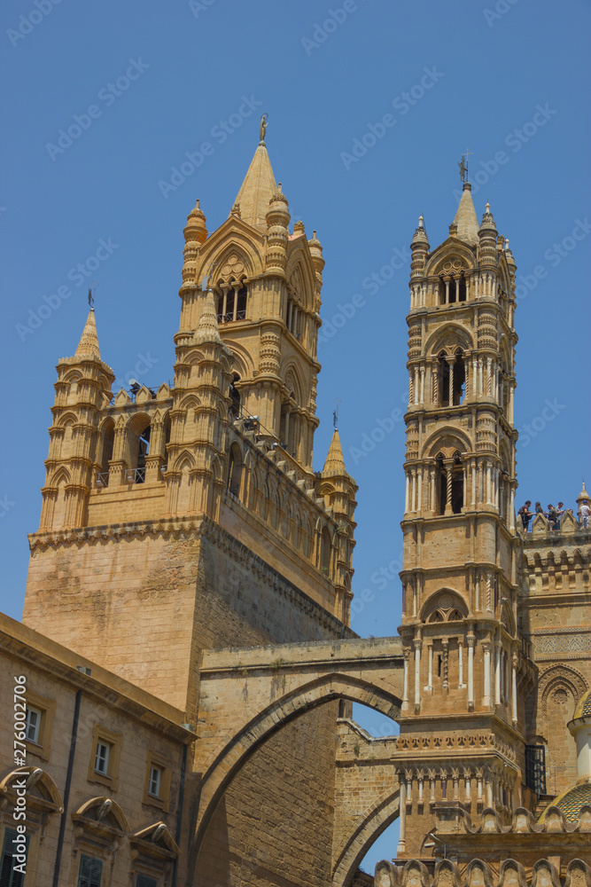 Beautiful historical towers of the cathedral of Palermo Sicily, famous tourist Unesco heritage, detail view of towers and arches