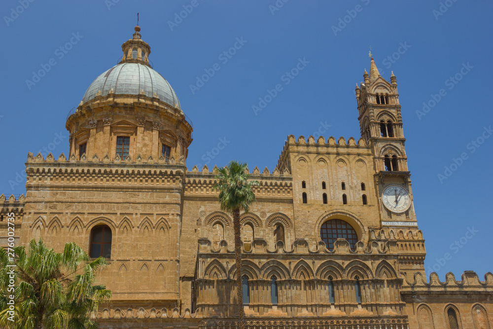 Historical cathedral of Palermo Sicily, detail view of the dome and the back side with the bell tower with clock