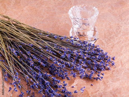 The dried-up lavender flowers on a table