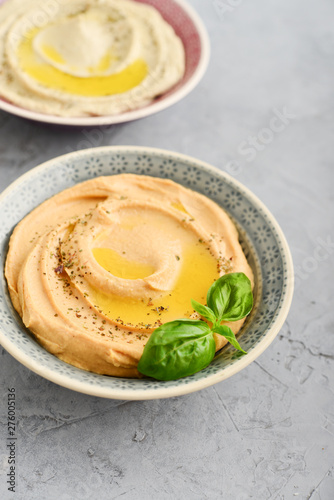 Bowls with different kinds hummus