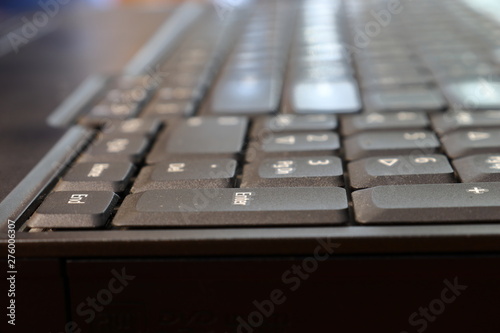 Closeup view on a laptop keyboard.