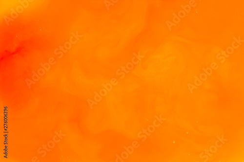 Abstract orange background. Bright orange pattern. Blank for designer in the pop art style. Colorful blurred backgrounds