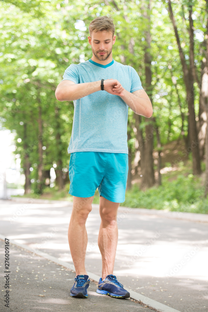 Sport coach. Sport wellbeing and self care. Handsome man sporty outfit look confident. Male beauty. Guy handsome bearded face. Sport is way of life. Sportsman lifestyle. Handsome athlete in park Sport coach. Sport wellbeing and self care. Handsome man sporty outfit look confident. Male beauty. Guy handsome bearded face. Sport is way of life. Sportsman lifestyle. Handsome athlete in park
