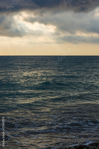 Amazing sea sunset, the sun, waves, clouds