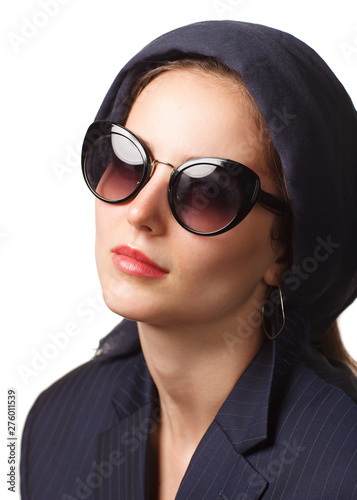 close up portrait of islamic style smiling woman in sunglasses