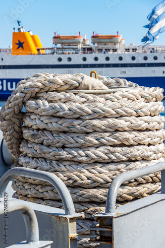 A coil of mooring line in front of a ferry at the Port of Kavala, Eastern Macedonia, Northern Greece