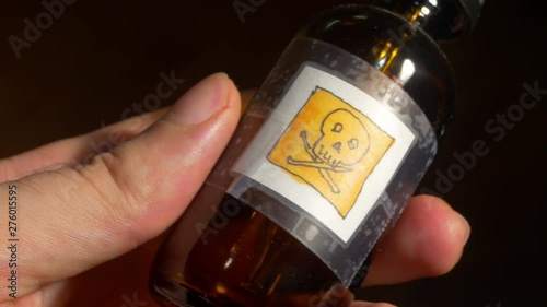 Poison bottle label with skull