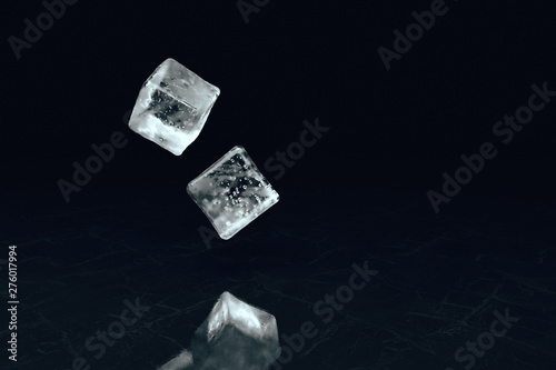 Two falling ice cubes on a textural surface in slow motion. 3d illustration