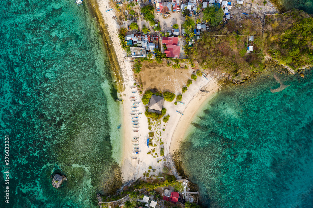Aerial drone view of small images on the tropical island of Malapascua