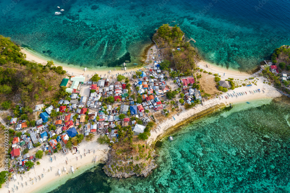 Aerial drone view of small images on the tropical island of Malapascua