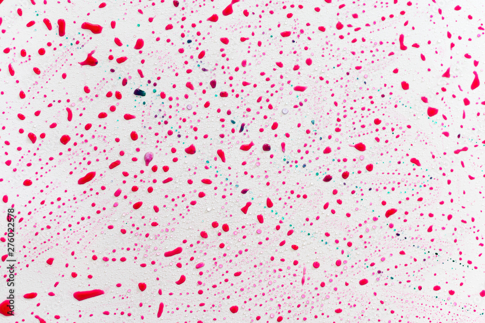 Colorful drops of water on a white background. Abstract background. Colorful drops of water on a white background. Abstract background.