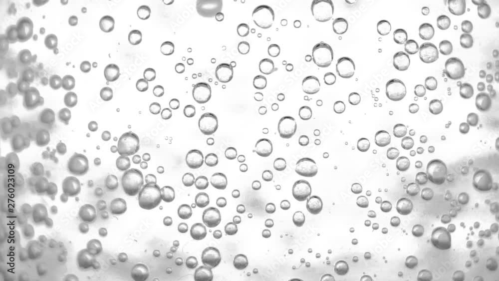 Water bubbles rising up and exploding Water bubbles rising up and exploding