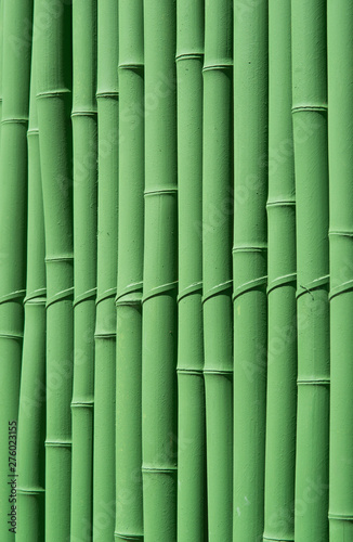 Green-painted bamboo fence, texture pattern abstract for background. 