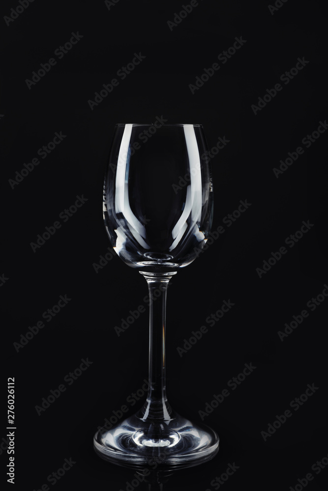 New clean empty glass on black background