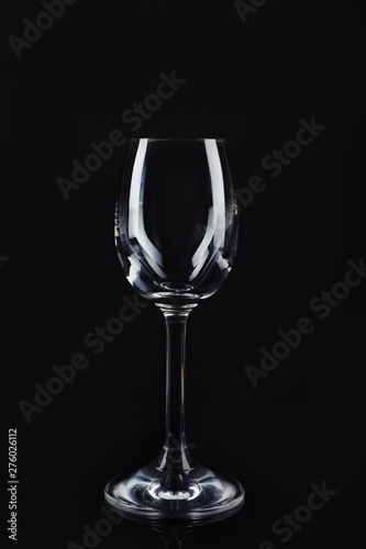 New clean empty glass on black background