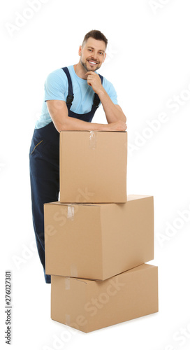 Portrait of moving service employee with cardboard boxes on white background