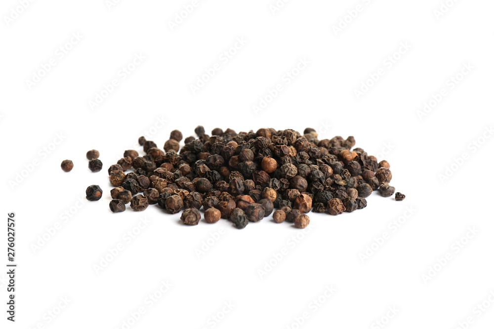 Heap of black peppercorns isolated on white Heap of black peppercorns isolated on white